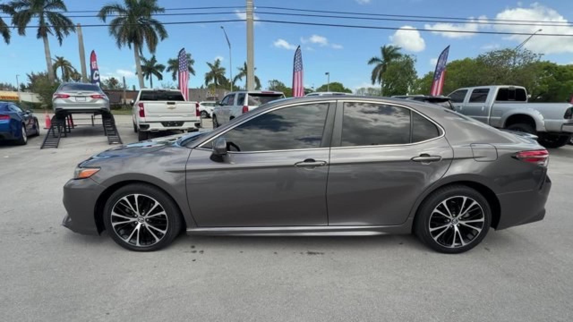 2019 Gray Toyota Camry (4T1B11HK7KU) with an 4 2.5 L engine, Automatic transmission, located at 27610 S Dixie Hwy, Homestead, FL, 33032, (305) 749-2348, 25.510241, -80.438301 - KBB.com 10 Best Sedans Under $30,000. This Toyota Camry boasts a Regular Unleaded I-4 2.5 L/152 engine powering this Automatic transmission. Wireless Phone Connectivity, Window Grid And Roof Mount Antenna, Variable Intermittent Wipers.*This Toyota Camry Comes Equipped with These Options *Valet Funct - Photo#1