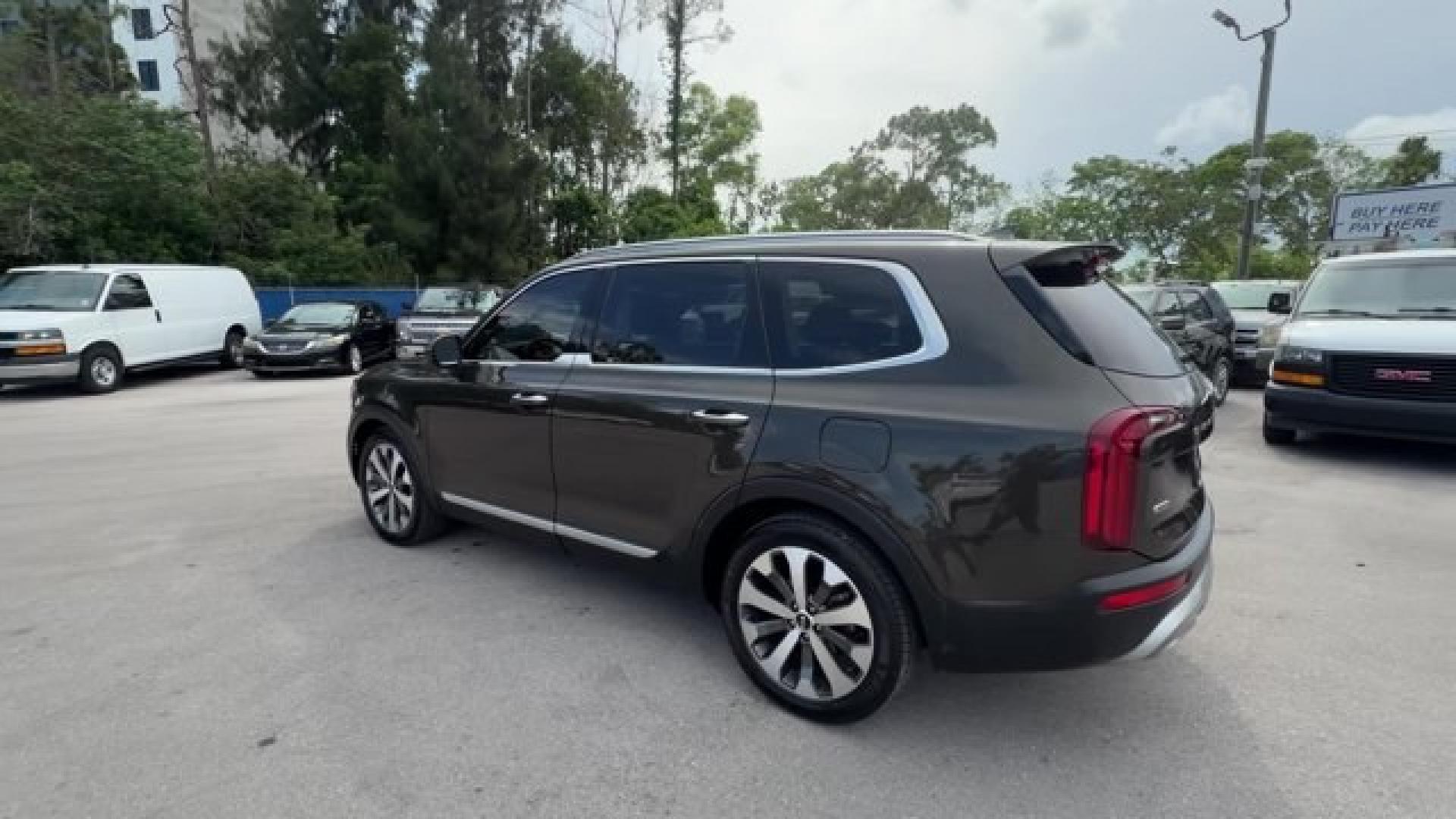 2020 Dark Moss /Black Kia Telluride (5XYP6DHC7LG) with an 6 3.8 L engine, Automatic transmission, located at 27610 S Dixie Hwy, Homestead, FL, 33032, (305) 749-2348, 25.510241, -80.438301 - KBB.com Best Buy Awards. Boasts 24 Highway MPG and 19 City MPG! This Kia Telluride delivers a Regular Unleaded V-6 3.8 L/231 engine powering this Automatic transmission. WHEEL LOCKS, EC MIRROR W/COMPASS and HOMELINK, DARK MOSS.* This Kia Telluride Features the Following Options *CARPETED FLOOR MAT- Photo#2