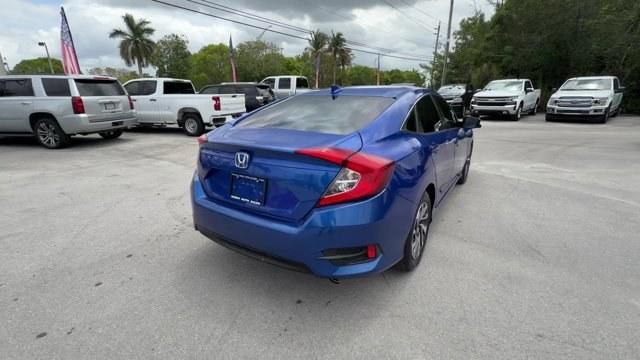 2017 Blue Honda Civic Sedan (19XFC2F79HE) with an 4 2.0 L engine, Variable transmission, located at 27610 S Dixie Hwy, Homestead, FL, 33032, (305) 749-2348, 25.510241, -80.438301 - IIHS Top Safety Pick. Delivers 40 Highway MPG and 31 City MPG! This Honda Civic Sedan boasts a Regular Unleaded I-4 2.0 L/122 engine powering this Variable transmission. Wireless Phone Connectivity, Window Grid Antenna, Wheels: 16 Alloy.*This Honda Civic Sedan Comes Equipped with These Options *Whee - Photo#4