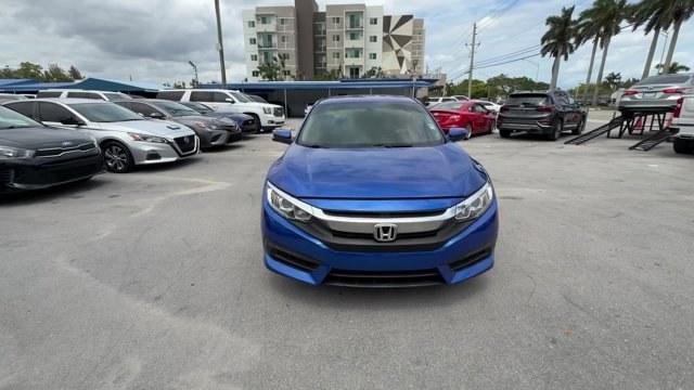 2017 Blue Honda Civic Sedan (19XFC2F79HE) with an 4 2.0 L engine, Variable transmission, located at 27610 S Dixie Hwy, Homestead, FL, 33032, (305) 749-2348, 25.510241, -80.438301 - IIHS Top Safety Pick. Delivers 40 Highway MPG and 31 City MPG! This Honda Civic Sedan boasts a Regular Unleaded I-4 2.0 L/122 engine powering this Variable transmission. Wireless Phone Connectivity, Window Grid Antenna, Wheels: 16 Alloy.*This Honda Civic Sedan Comes Equipped with These Options *Whee - Photo#7