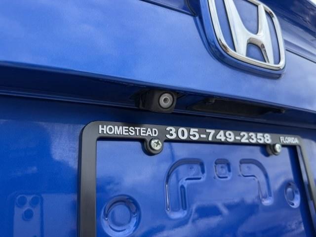2017 Blue Honda Civic Sedan (19XFC2F79HE) with an 4 2.0 L engine, Variable transmission, located at 27610 S Dixie Hwy, Homestead, FL, 33032, (305) 749-2348, 25.510241, -80.438301 - IIHS Top Safety Pick. Delivers 40 Highway MPG and 31 City MPG! This Honda Civic Sedan boasts a Regular Unleaded I-4 2.0 L/122 engine powering this Variable transmission. Wireless Phone Connectivity, Window Grid Antenna, Wheels: 16 Alloy.*This Honda Civic Sedan Comes Equipped with These Options *Whee - Photo#16