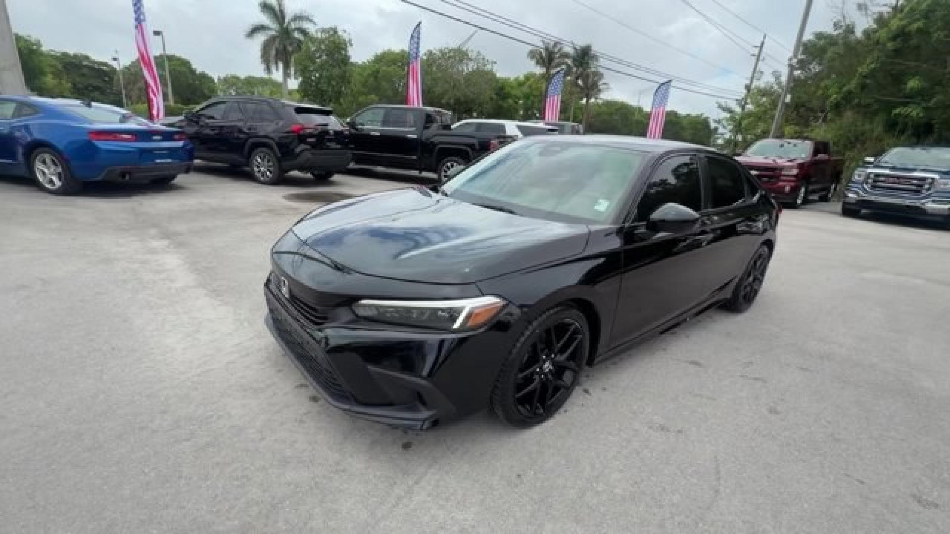 2022 Black Honda Civic Sedan (2HGFE2F51NH) with an 4 2.0 L engine, Variable transmission, located at 27610 S Dixie Hwy, Homestead, FL, 33032, (305) 749-2348, 25.510241, -80.438301 - NACTOY 2022 North American Car of the Year. Scores 37 Highway MPG and 30 City MPG! This Honda Civic Sedan boasts a Regular Unleaded I-4 2.0 L/122 engine powering this Variable transmission. Wireless Phone Connectivity, Wheels: 18 Gloss Black Alloy, Vehicle Stability Assist (VSA) Electronic Stability - Photo#0