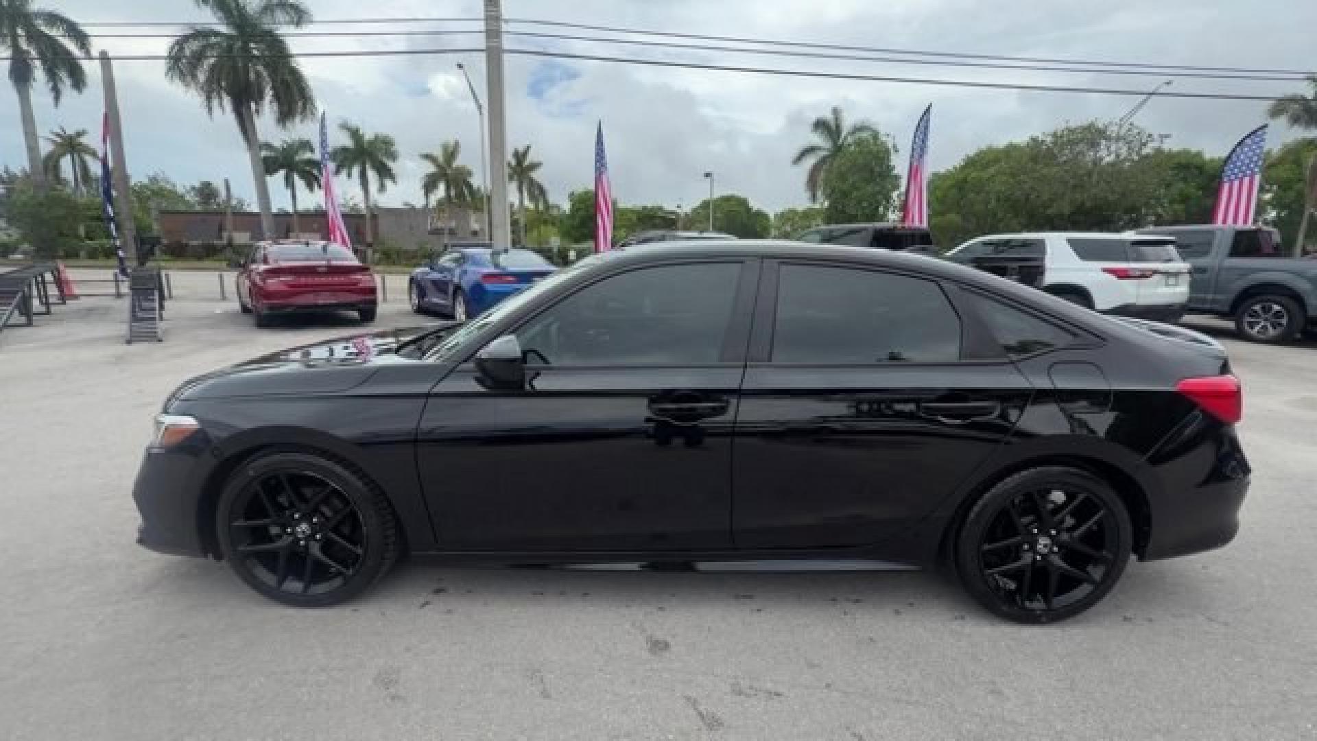 2022 Black Honda Civic Sedan (2HGFE2F51NH) with an 4 2.0 L engine, Variable transmission, located at 27610 S Dixie Hwy, Homestead, FL, 33032, (305) 749-2348, 25.510241, -80.438301 - NACTOY 2022 North American Car of the Year. Scores 37 Highway MPG and 30 City MPG! This Honda Civic Sedan boasts a Regular Unleaded I-4 2.0 L/122 engine powering this Variable transmission. Wireless Phone Connectivity, Wheels: 18 Gloss Black Alloy, Vehicle Stability Assist (VSA) Electronic Stability - Photo#1
