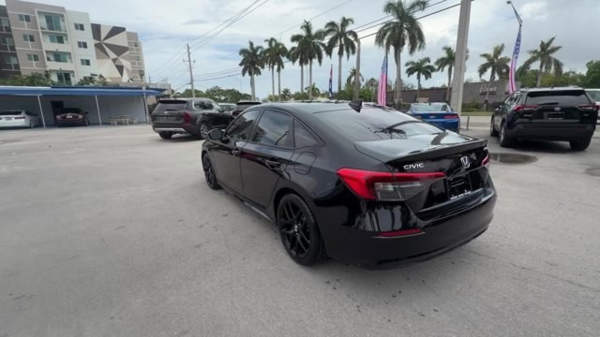 2022 Black Honda Civic Sedan (2HGFE2F51NH) with an 4 2.0 L engine, Variable transmission, located at 27610 S Dixie Hwy, Homestead, FL, 33032, (305) 749-2348, 25.510241, -80.438301 - NACTOY 2022 North American Car of the Year. Scores 37 Highway MPG and 30 City MPG! This Honda Civic Sedan boasts a Regular Unleaded I-4 2.0 L/122 engine powering this Variable transmission. Wireless Phone Connectivity, Wheels: 18 Gloss Black Alloy, Vehicle Stability Assist (VSA) Electronic Stability - Photo#2
