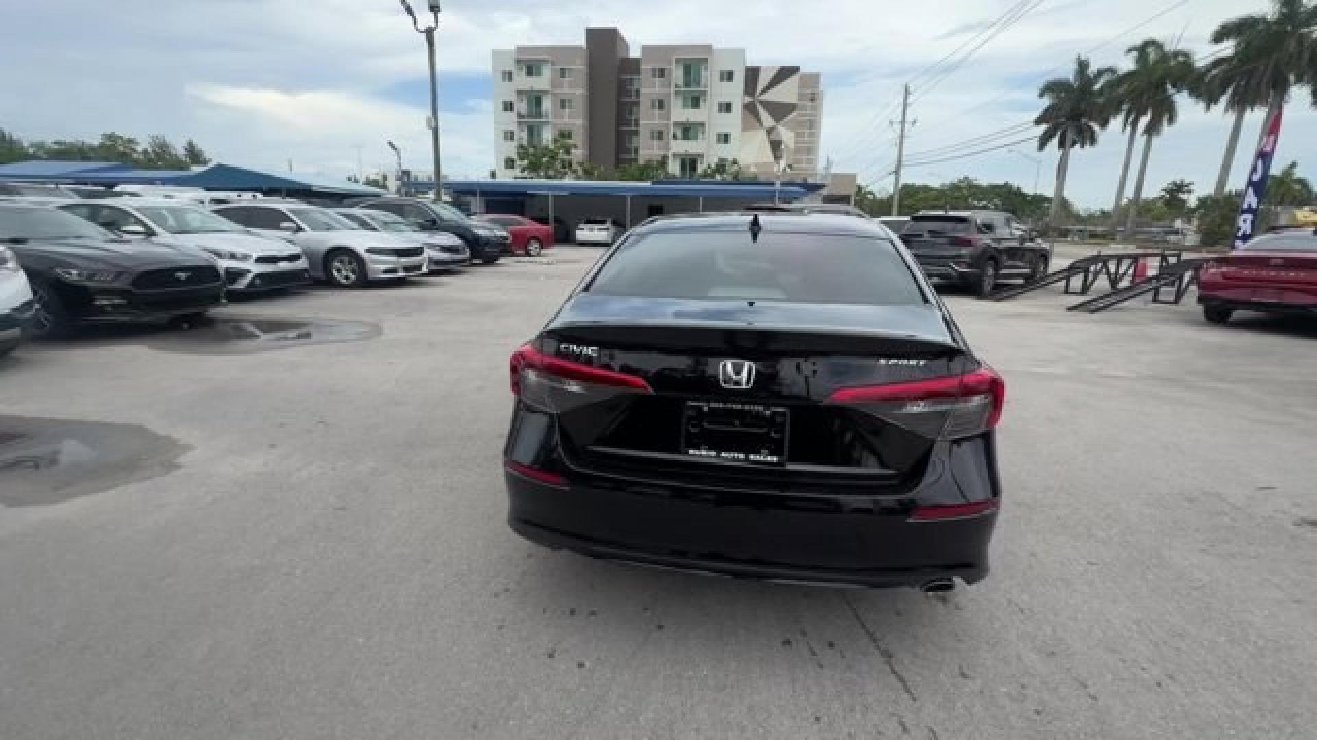 2022 Black Honda Civic Sedan (2HGFE2F51NH) with an 4 2.0 L engine, Variable transmission, located at 27610 S Dixie Hwy, Homestead, FL, 33032, (305) 749-2348, 25.510241, -80.438301 - NACTOY 2022 North American Car of the Year. Scores 37 Highway MPG and 30 City MPG! This Honda Civic Sedan boasts a Regular Unleaded I-4 2.0 L/122 engine powering this Variable transmission. Wireless Phone Connectivity, Wheels: 18 Gloss Black Alloy, Vehicle Stability Assist (VSA) Electronic Stability - Photo#3