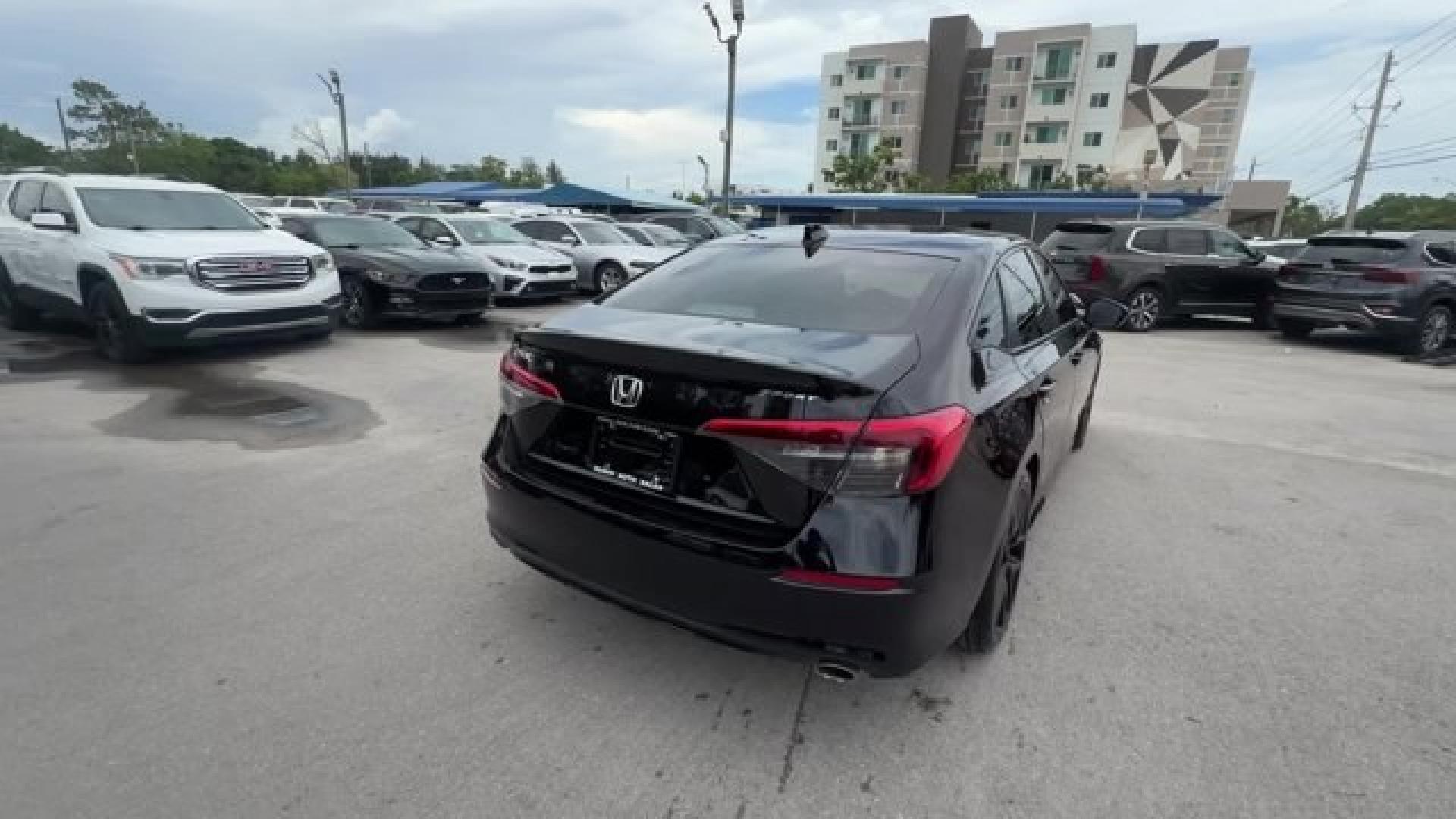 2022 Black Honda Civic Sedan (2HGFE2F51NH) with an 4 2.0 L engine, Variable transmission, located at 27610 S Dixie Hwy, Homestead, FL, 33032, (305) 749-2348, 25.510241, -80.438301 - NACTOY 2022 North American Car of the Year. Scores 37 Highway MPG and 30 City MPG! This Honda Civic Sedan boasts a Regular Unleaded I-4 2.0 L/122 engine powering this Variable transmission. Wireless Phone Connectivity, Wheels: 18 Gloss Black Alloy, Vehicle Stability Assist (VSA) Electronic Stability - Photo#4