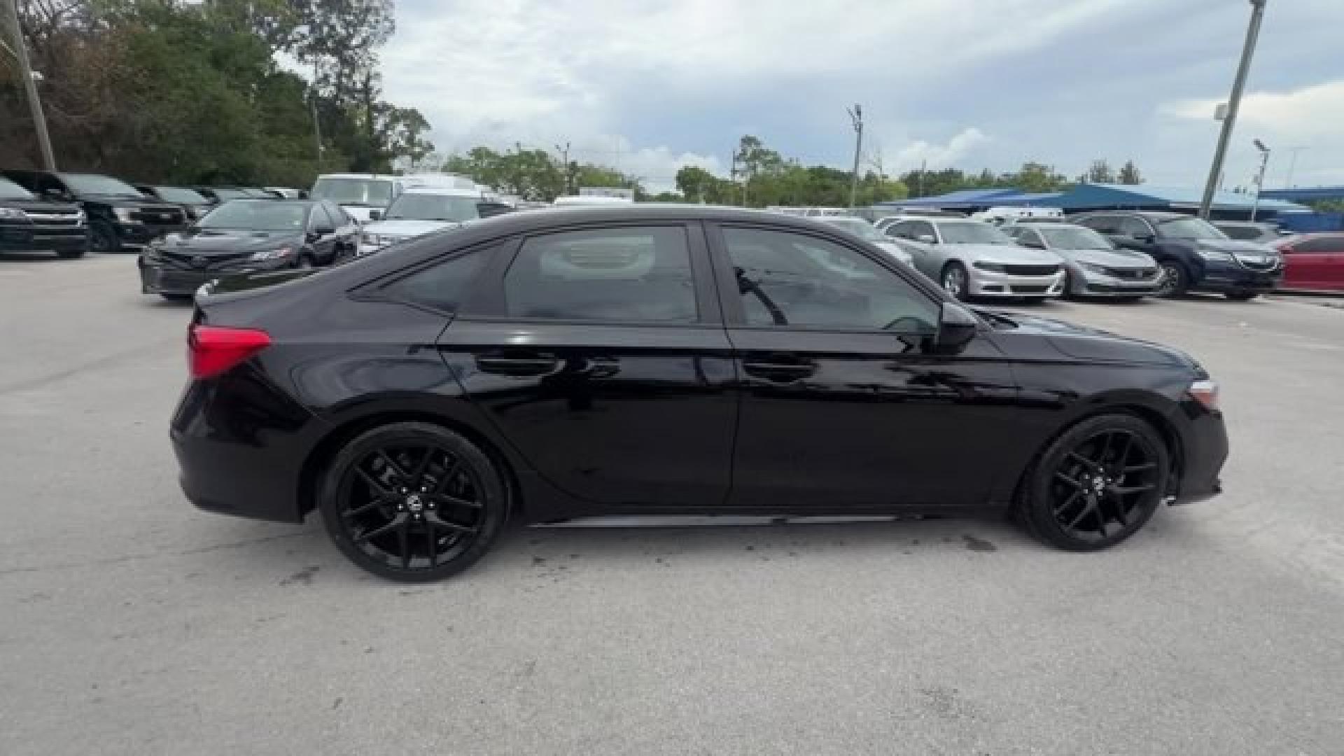2022 Black Honda Civic Sedan (2HGFE2F51NH) with an 4 2.0 L engine, Variable transmission, located at 27610 S Dixie Hwy, Homestead, FL, 33032, (305) 749-2348, 25.510241, -80.438301 - NACTOY 2022 North American Car of the Year. Scores 37 Highway MPG and 30 City MPG! This Honda Civic Sedan boasts a Regular Unleaded I-4 2.0 L/122 engine powering this Variable transmission. Wireless Phone Connectivity, Wheels: 18 Gloss Black Alloy, Vehicle Stability Assist (VSA) Electronic Stability - Photo#5