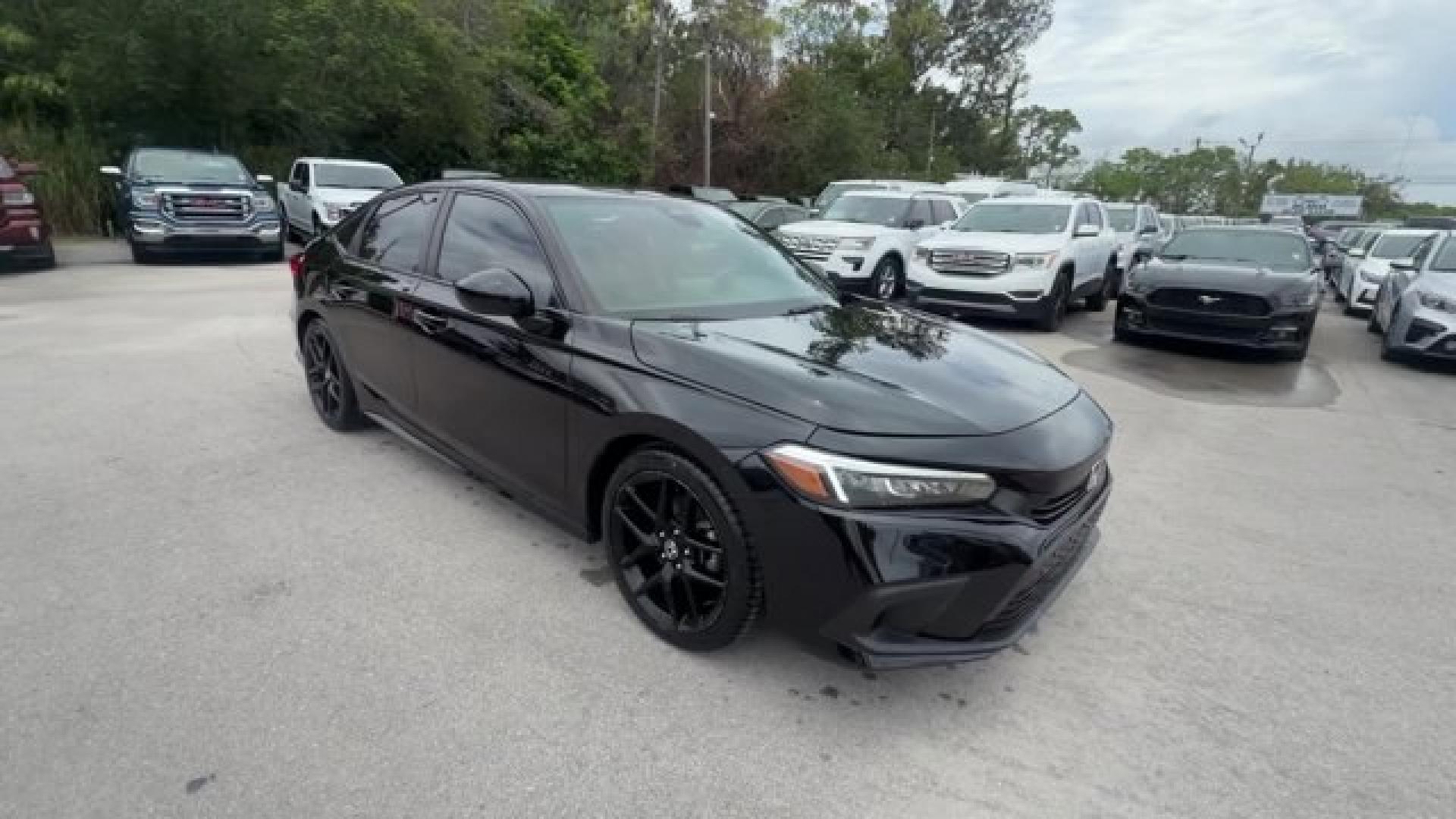 2022 Black Honda Civic Sedan (2HGFE2F51NH) with an 4 2.0 L engine, Variable transmission, located at 27610 S Dixie Hwy, Homestead, FL, 33032, (305) 749-2348, 25.510241, -80.438301 - NACTOY 2022 North American Car of the Year. Scores 37 Highway MPG and 30 City MPG! This Honda Civic Sedan boasts a Regular Unleaded I-4 2.0 L/122 engine powering this Variable transmission. Wireless Phone Connectivity, Wheels: 18 Gloss Black Alloy, Vehicle Stability Assist (VSA) Electronic Stability - Photo#6