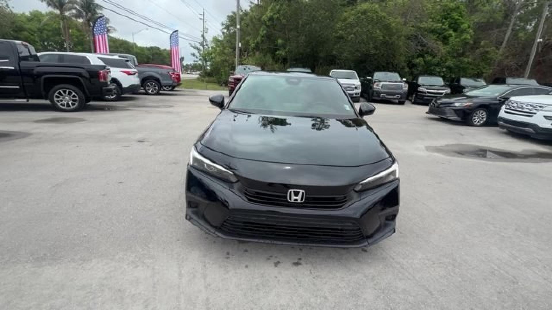 2022 Black Honda Civic Sedan (2HGFE2F51NH) with an 4 2.0 L engine, Variable transmission, located at 27610 S Dixie Hwy, Homestead, FL, 33032, (305) 749-2348, 25.510241, -80.438301 - NACTOY 2022 North American Car of the Year. Scores 37 Highway MPG and 30 City MPG! This Honda Civic Sedan boasts a Regular Unleaded I-4 2.0 L/122 engine powering this Variable transmission. Wireless Phone Connectivity, Wheels: 18 Gloss Black Alloy, Vehicle Stability Assist (VSA) Electronic Stability - Photo#7