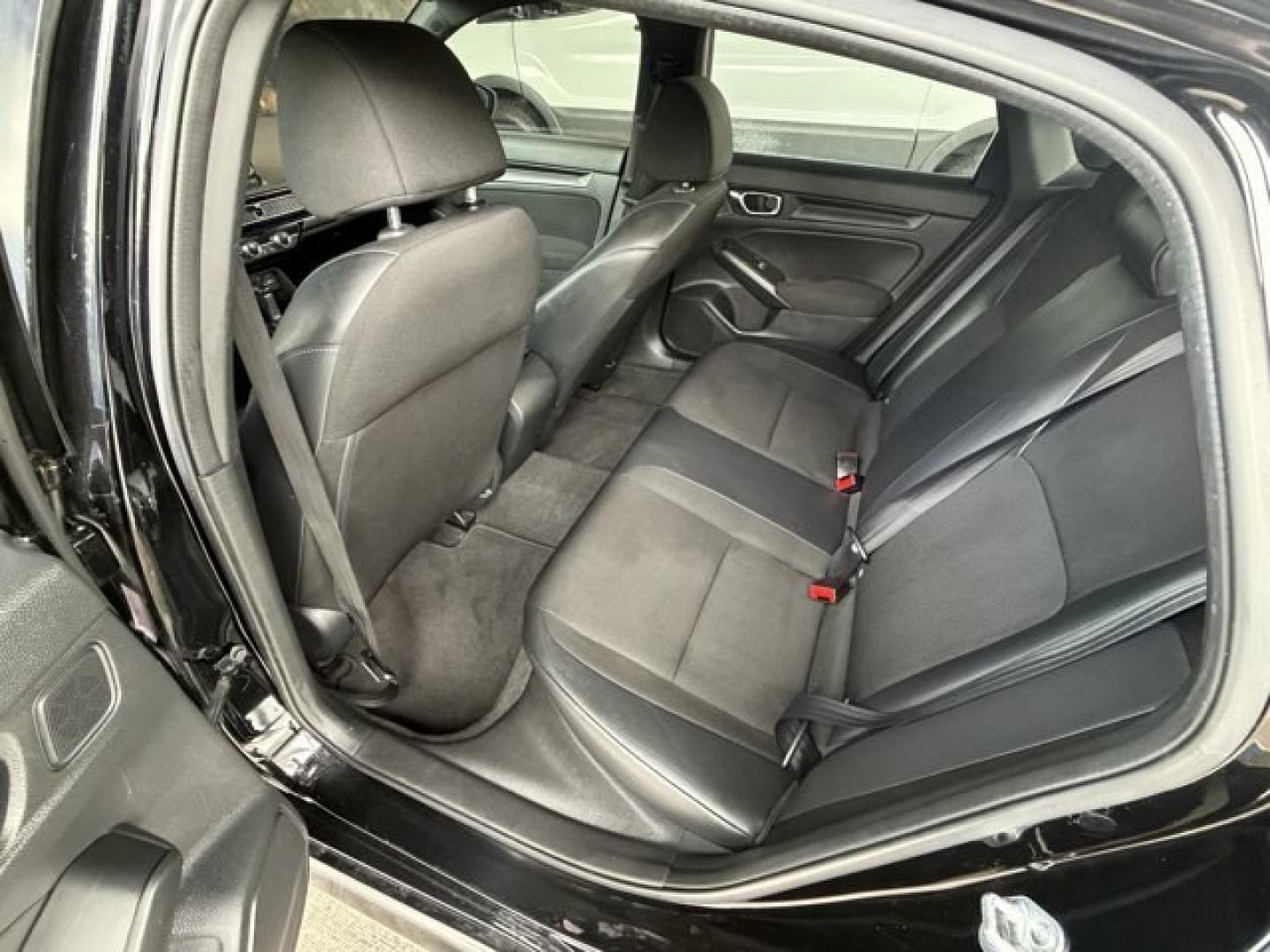 2022 Black Honda Civic Sedan (2HGFE2F51NH) with an 4 2.0 L engine, Variable transmission, located at 27610 S Dixie Hwy, Homestead, FL, 33032, (305) 749-2348, 25.510241, -80.438301 - NACTOY 2022 North American Car of the Year. Scores 37 Highway MPG and 30 City MPG! This Honda Civic Sedan boasts a Regular Unleaded I-4 2.0 L/122 engine powering this Variable transmission. Wireless Phone Connectivity, Wheels: 18 Gloss Black Alloy, Vehicle Stability Assist (VSA) Electronic Stability - Photo#11