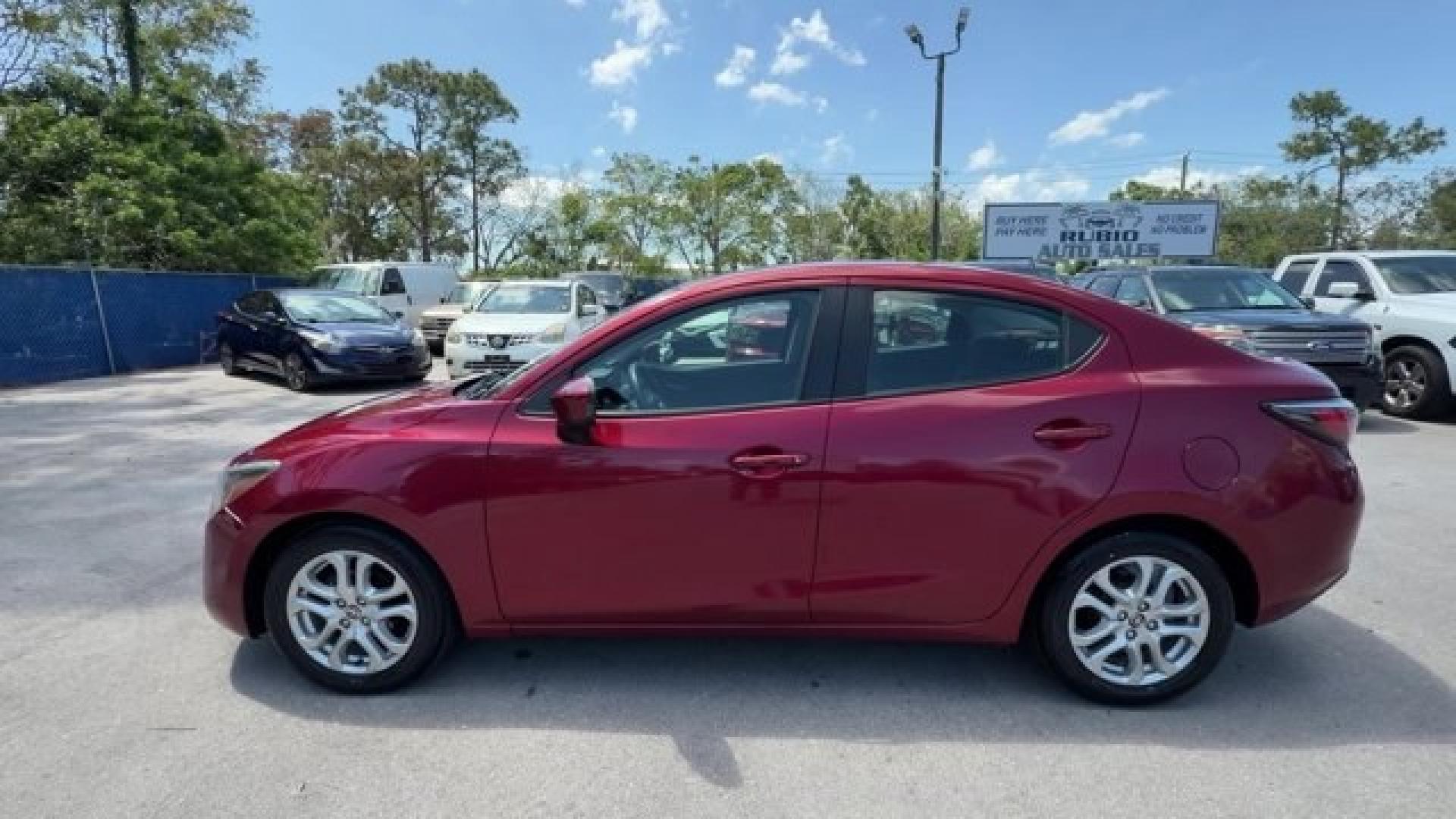 2016 Red Scion iA (3MYDLBZV2GY) with an 4 1.5 L engine, Automatic transmission, located at 27610 S Dixie Hwy, Homestead, FL, 33032, (305) 749-2348, 25.510241, -80.438301 - IIHS Top Safety Pick+, Top Safety Pick+, Top Safety Pick+. Only 105,288 Miles! Scores 42 Highway MPG and 33 City MPG! This Scion iA delivers a Regular Unleaded I-4 1.5 L/91 engine powering this Automatic transmission. Wireless Phone Connectivity, Wheels w/Machined w/Painted Accents Accents, Variable - Photo#1
