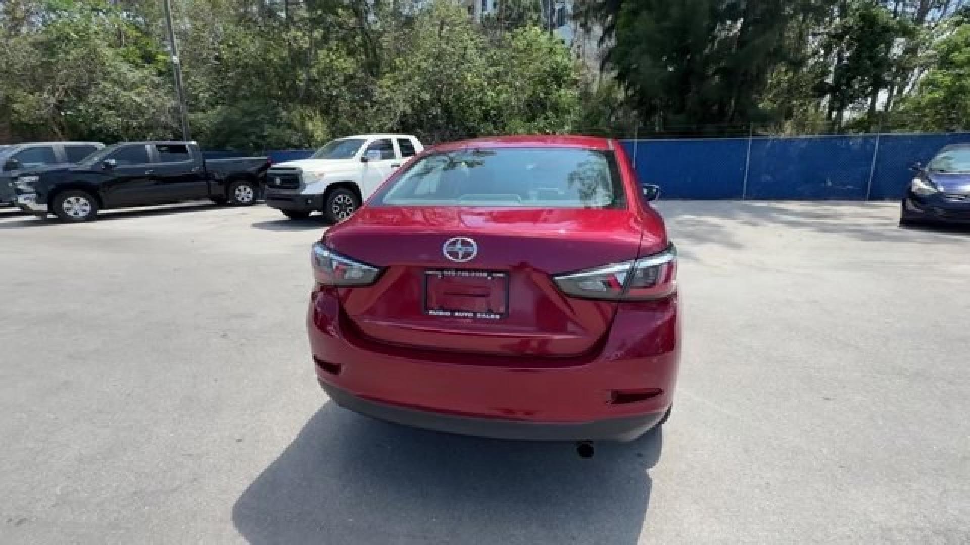 2016 Red Scion iA (3MYDLBZV2GY) with an 4 1.5 L engine, Automatic transmission, located at 27610 S Dixie Hwy, Homestead, FL, 33032, (305) 749-2348, 25.510241, -80.438301 - IIHS Top Safety Pick+, Top Safety Pick+, Top Safety Pick+. Only 105,288 Miles! Scores 42 Highway MPG and 33 City MPG! This Scion iA delivers a Regular Unleaded I-4 1.5 L/91 engine powering this Automatic transmission. Wireless Phone Connectivity, Wheels w/Machined w/Painted Accents Accents, Variable - Photo#3