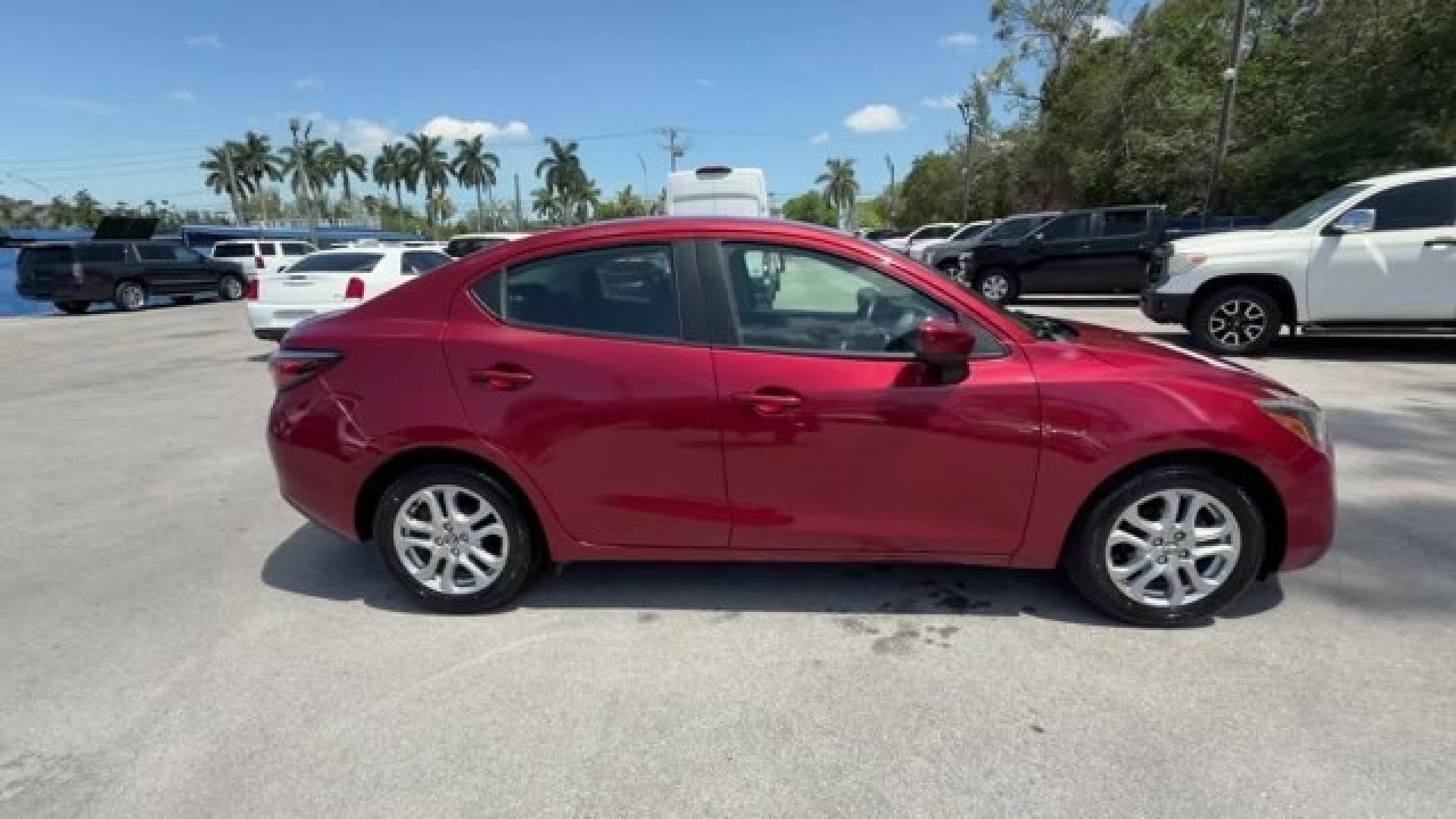 2016 Red Scion iA (3MYDLBZV2GY) with an 4 1.5 L engine, Automatic transmission, located at 27610 S Dixie Hwy, Homestead, FL, 33032, (305) 749-2348, 25.510241, -80.438301 - IIHS Top Safety Pick+, Top Safety Pick+, Top Safety Pick+. Only 105,288 Miles! Scores 42 Highway MPG and 33 City MPG! This Scion iA delivers a Regular Unleaded I-4 1.5 L/91 engine powering this Automatic transmission. Wireless Phone Connectivity, Wheels w/Machined w/Painted Accents Accents, Variable - Photo#5