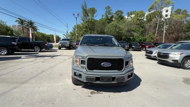 2019 Gray Ford F-150 (1FTEW1EPXKK) with an 6 2.7 L engine, Automatic transmission, located at 27610 S Dixie Hwy, Homestead, FL, 33032, (305) 749-2348, 25.510241, -80.438301 - This Ford F-150 boasts a Regular Unleaded 2.7 L EcoBoost engine powering this Automatic transmission. Variable Intermittent Wipers, Urethane Gear Shifter Material, Transmission w/Driver Selectable Mode and SelectShift Sequential Shift Control.*This Ford F-150 Comes Equipped with These Options *Towin - Photo#7