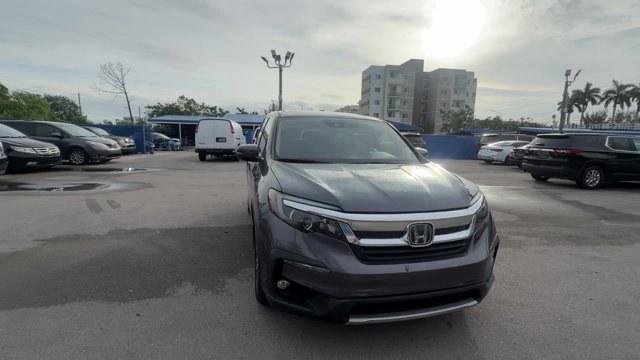 2020 Gray Honda Pilot (5FNYF5H32LB) with an 6 3.5 L engine, Automatic transmission, located at 27610 S Dixie Hwy, Homestead, FL, 33032, (305) 749-2348, 25.510241, -80.438301 - Boasts 27 Highway MPG and 19 City MPG! This Honda Pilot delivers a Regular Unleaded V-6 3.5 L/212 engine powering this Automatic transmission. Wireless Phone Connectivity, VSA Electronic Stability Control (ESC), Valet Function.* This Honda Pilot Features the Following Options *Urethane Gear Shifter - Photo#7