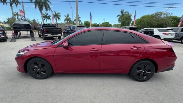 2021 Scarlet Red Pearl /Medium Gray Hyundai Elantra (KMHLS4AG3MU) with an 4 2.0 L engine, Variable transmission, located at 27610 S Dixie Hwy, Homestead, FL, 33032, (305) 749-2348, 25.510241, -80.438301 - NACTOY 2021 North American Car of the Year. Delivers 41 Highway MPG and 31 City MPG! This Hyundai Elantra boasts a Regular Unleaded I-4 2.0 L/122 engine powering this Variable transmission. WHEEL LOCKS, SCARLET RED PEARL, REVERSIBLE CARGO TRAY.* This Hyundai Elantra Features the Following Options *C - Photo#1