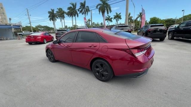 2021 Scarlet Red Pearl /Medium Gray Hyundai Elantra (KMHLS4AG3MU) with an 4 2.0 L engine, Variable transmission, located at 27610 S Dixie Hwy, Homestead, FL, 33032, (305) 749-2348, 25.510241, -80.438301 - NACTOY 2021 North American Car of the Year. Delivers 41 Highway MPG and 31 City MPG! This Hyundai Elantra boasts a Regular Unleaded I-4 2.0 L/122 engine powering this Variable transmission. WHEEL LOCKS, SCARLET RED PEARL, REVERSIBLE CARGO TRAY.* This Hyundai Elantra Features the Following Options *C - Photo#2