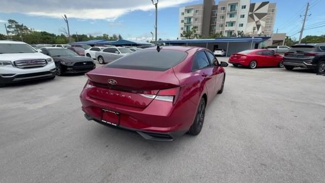 2021 Scarlet Red Pearl /Medium Gray Hyundai Elantra (KMHLS4AG3MU) with an 4 2.0 L engine, Variable transmission, located at 27610 S Dixie Hwy, Homestead, FL, 33032, (305) 749-2348, 25.510241, -80.438301 - NACTOY 2021 North American Car of the Year. Delivers 41 Highway MPG and 31 City MPG! This Hyundai Elantra boasts a Regular Unleaded I-4 2.0 L/122 engine powering this Variable transmission. WHEEL LOCKS, SCARLET RED PEARL, REVERSIBLE CARGO TRAY.* This Hyundai Elantra Features the Following Options *C - Photo#4