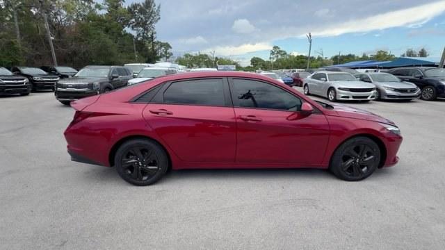 2021 Scarlet Red Pearl /Medium Gray Hyundai Elantra (KMHLS4AG3MU) with an 4 2.0 L engine, Variable transmission, located at 27610 S Dixie Hwy, Homestead, FL, 33032, (305) 749-2348, 25.510241, -80.438301 - NACTOY 2021 North American Car of the Year. Delivers 41 Highway MPG and 31 City MPG! This Hyundai Elantra boasts a Regular Unleaded I-4 2.0 L/122 engine powering this Variable transmission. WHEEL LOCKS, SCARLET RED PEARL, REVERSIBLE CARGO TRAY.* This Hyundai Elantra Features the Following Options *C - Photo#5