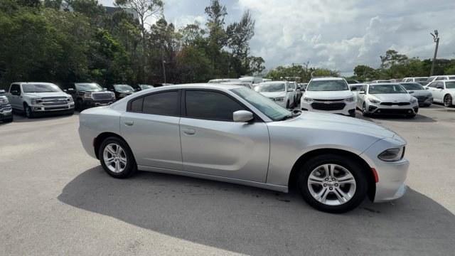 2021 Triple Nickel Clearcoat /Black Dodge Charger (2C3CDXBG6MH) with an 6 3.6 L engine, Automatic transmission, located at 27610 S Dixie Hwy, Homestead, FL, 33032, (305) 749-2348, 25.510241, -80.438301 - Scores 30 Highway MPG and 19 City MPG! This Dodge Charger delivers a Regular Unleaded V-6 3.6 L/220 engine powering this Automatic transmission. WHEELS: 17 X 7.0 PAINTED CAST ALUMINUM (STD), TRANSMISSION: 8-SPEED AUTOMATIC (8HP50) (STD), TIRES: P215/65R17 LOW ROLLING RES (STD).*This Dodge Charger Co - Photo#5