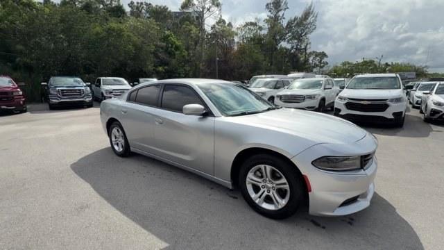 2021 Triple Nickel Clearcoat /Black Dodge Charger (2C3CDXBG6MH) with an 6 3.6 L engine, Automatic transmission, located at 27610 S Dixie Hwy, Homestead, FL, 33032, (305) 749-2348, 25.510241, -80.438301 - Scores 30 Highway MPG and 19 City MPG! This Dodge Charger delivers a Regular Unleaded V-6 3.6 L/220 engine powering this Automatic transmission. WHEELS: 17 X 7.0 PAINTED CAST ALUMINUM (STD), TRANSMISSION: 8-SPEED AUTOMATIC (8HP50) (STD), TIRES: P215/65R17 LOW ROLLING RES (STD).*This Dodge Charger Co - Photo#6
