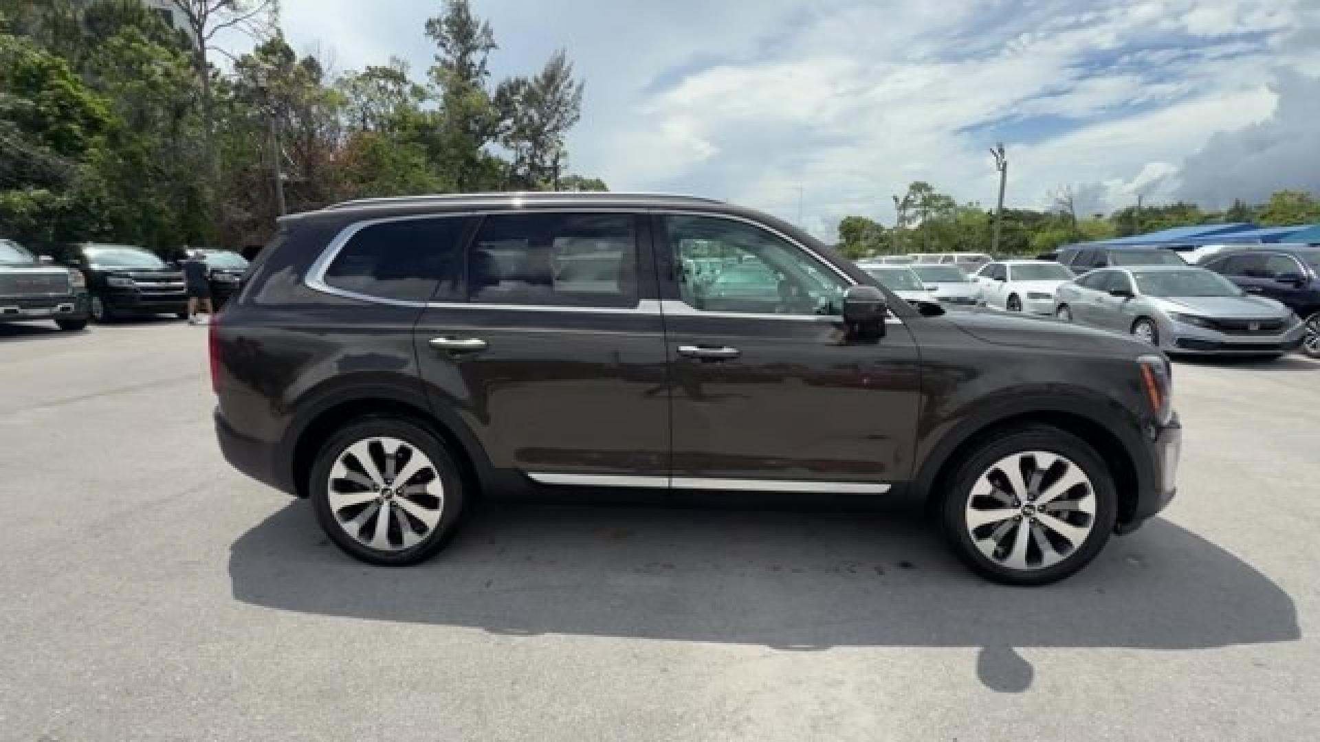 2020 Dark Moss /Black Kia Telluride (5XYP64HC8LG) with an 6 3.8 L engine, Automatic transmission, located at 27610 S Dixie Hwy, Homestead, FL, 33032, (305) 749-2348, 25.510241, -80.438301 - NACTOY 2020 North American Utility of the Year. Scores 26 Highway MPG and 20 City MPG! This Kia Telluride boasts a Regular Unleaded V-6 3.8 L/231 engine powering this Automatic transmission. DARK MOSS, CARPETED FLOOR MATS, BLACK, SOFINO ARTIFICIAL LEATHER UPHOLSTERY.*This Kia Telluride Comes Equippe- Photo#5