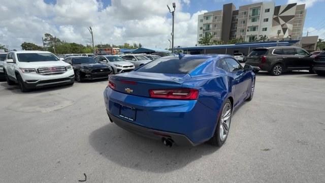 2018 Hyper Blue Metallic /Jet Black Chevrolet Camaro (1G1FB1RX6J0) with an 4 2.0L engine, Automatic transmission, located at 27610 S Dixie Hwy, Homestead, FL, 33032, (305) 749-2348, 25.510241, -80.438301 - KBB.com 10 Coolest Cars Under $25,000. Scores 31 Highway MPG and 22 City MPG! This Chevrolet Camaro delivers a Gas I4 2.0L/122 engine powering this Automatic transmission. WHEELS, 20 (50.8 CM) 5-SPLIT SPOKE PREMIUM GRAY-PAINTED, MACHINED-FACE ALUMINUM, TIRES, 245/40R20, BLACKWALL, ALL-SEASON, RUN-FL - Photo#4