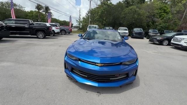 2018 Hyper Blue Metallic /Jet Black Chevrolet Camaro (1G1FB1RX6J0) with an 4 2.0L engine, Automatic transmission, located at 27610 S Dixie Hwy, Homestead, FL, 33032, (305) 749-2348, 25.510241, -80.438301 - KBB.com 10 Coolest Cars Under $25,000. Scores 31 Highway MPG and 22 City MPG! This Chevrolet Camaro delivers a Gas I4 2.0L/122 engine powering this Automatic transmission. WHEELS, 20 (50.8 CM) 5-SPLIT SPOKE PREMIUM GRAY-PAINTED, MACHINED-FACE ALUMINUM, TIRES, 245/40R20, BLACKWALL, ALL-SEASON, RUN-FL - Photo#7