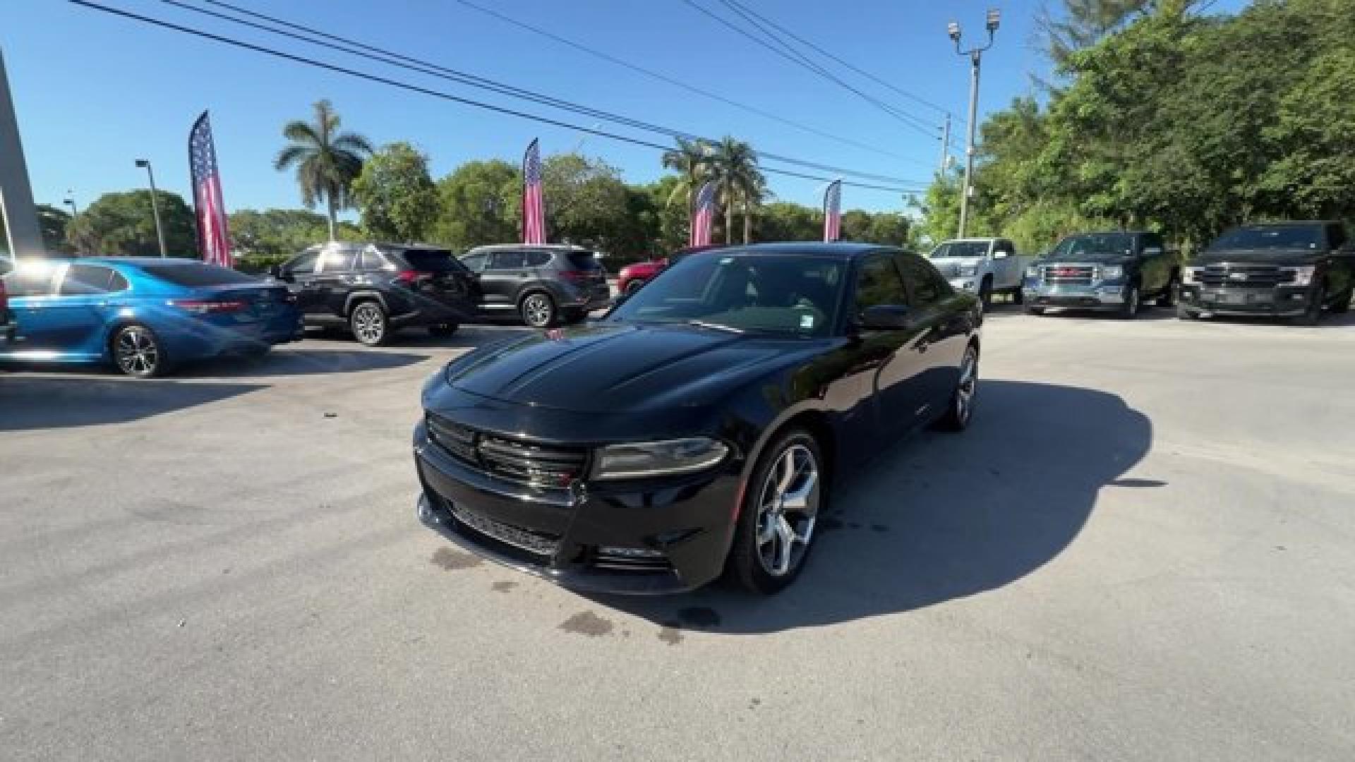2016 Pitch Black Clearcoat /Black Dodge Charger (2C3CDXCT0GH) with an 8 5.7 L engine, Automatic transmission, located at 27610 S Dixie Hwy, Homestead, FL, 33032, (305) 749-2348, 25.510241, -80.438301 - KBB.com 10 Best Used Cars Under $20,000. Only 109,229 Miles! Boasts 25 Highway MPG and 16 City MPG! This Dodge Charger delivers a Regular Unleaded V-8 5.7 L/345 engine powering this Automatic transmission. TRANSMISSION: 8-SPEED AUTOMATIC (8HP70) (STD), QUICK ORDER PACKAGE 29N R/T -inc: Engine: 5.7L- Photo#0