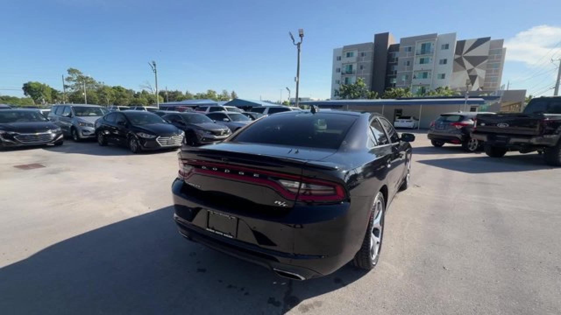 2016 Pitch Black Clearcoat /Black Dodge Charger (2C3CDXCT0GH) with an 8 5.7 L engine, Automatic transmission, located at 27610 S Dixie Hwy, Homestead, FL, 33032, (305) 749-2348, 25.510241, -80.438301 - KBB.com 10 Best Used Cars Under $20,000. Only 109,229 Miles! Boasts 25 Highway MPG and 16 City MPG! This Dodge Charger delivers a Regular Unleaded V-8 5.7 L/345 engine powering this Automatic transmission. TRANSMISSION: 8-SPEED AUTOMATIC (8HP70) (STD), QUICK ORDER PACKAGE 29N R/T -inc: Engine: 5.7L- Photo#3