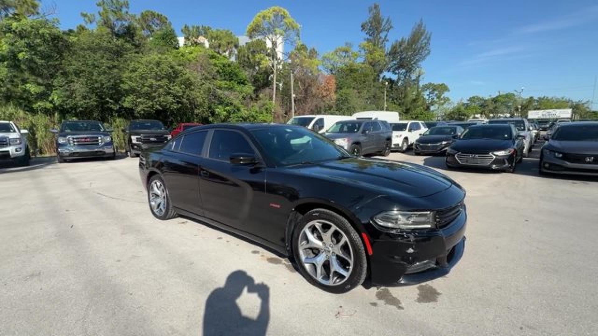 2016 Pitch Black Clearcoat /Black Dodge Charger (2C3CDXCT0GH) with an 8 5.7 L engine, Automatic transmission, located at 27610 S Dixie Hwy, Homestead, FL, 33032, (305) 749-2348, 25.510241, -80.438301 - KBB.com 10 Best Used Cars Under $20,000. Only 109,229 Miles! Boasts 25 Highway MPG and 16 City MPG! This Dodge Charger delivers a Regular Unleaded V-8 5.7 L/345 engine powering this Automatic transmission. TRANSMISSION: 8-SPEED AUTOMATIC (8HP70) (STD), QUICK ORDER PACKAGE 29N R/T -inc: Engine: 5.7L- Photo#5