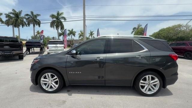 2020 Nightfall Gray Metallic /Jet Black Chevrolet Equinox (3GNAXPEX4LS) with an 4 2.0L engine, Automatic transmission, located at 27610 S Dixie Hwy, Homestead, FL, 33032, (305) 749-2348, 25.510241, -80.438301 - IIHS Top Safety Pick with specific headlights. Scores 29 Highway MPG and 22 City MPG! This Chevrolet Equinox delivers a Turbocharged Gas I4 2.0L/122 engine powering this Automatic transmission. TRANSMISSION, 9-SPEED AUTOMATIC, ELECTRONICALLY-CONTROLLED WITH OVERDRIVE includes Driver Shift Control (S- Photo#1