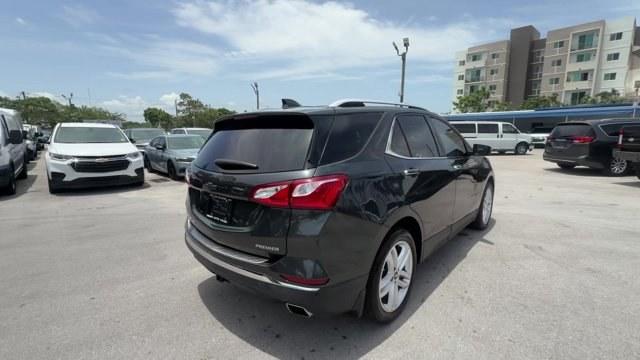 2020 Nightfall Gray Metallic /Jet Black Chevrolet Equinox (3GNAXPEX4LS) with an 4 2.0L engine, Automatic transmission, located at 27610 S Dixie Hwy, Homestead, FL, 33032, (305) 749-2348, 25.510241, -80.438301 - IIHS Top Safety Pick with specific headlights. Scores 29 Highway MPG and 22 City MPG! This Chevrolet Equinox delivers a Turbocharged Gas I4 2.0L/122 engine powering this Automatic transmission. TRANSMISSION, 9-SPEED AUTOMATIC, ELECTRONICALLY-CONTROLLED WITH OVERDRIVE includes Driver Shift Control (S- Photo#4
