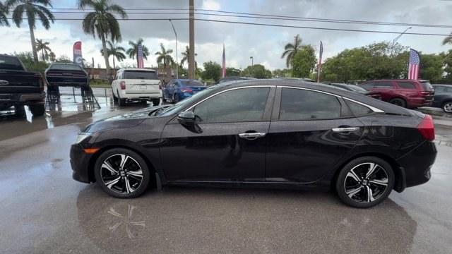 2016 Black Honda Civic Sedan (2HGFC1F92GH) with an 4 1.5 L engine, Variable transmission, located at 27610 S Dixie Hwy, Homestead, FL, 33032, (305) 749-2348, 25.510241, -80.438301 - IIHS Top Safety Pick+. Boasts 42 Highway MPG and 31 City MPG! This Honda Civic Sedan boasts a Intercooled Turbo Regular Unleaded I-4 1.5 L/91 engine powering this Variable transmission. Wireless Phone Connectivity, Wheels: 17 Alloy, Wheels w/Machined w/Painted Accents Accents.*This Honda Civic Sedan- Photo#3