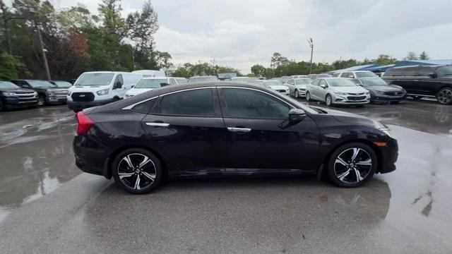 2016 Black Honda Civic Sedan (2HGFC1F92GH) with an 4 1.5 L engine, Variable transmission, located at 27610 S Dixie Hwy, Homestead, FL, 33032, (305) 749-2348, 25.510241, -80.438301 - IIHS Top Safety Pick+. Boasts 42 Highway MPG and 31 City MPG! This Honda Civic Sedan boasts a Intercooled Turbo Regular Unleaded I-4 1.5 L/91 engine powering this Variable transmission. Wireless Phone Connectivity, Wheels: 17 Alloy, Wheels w/Machined w/Painted Accents Accents.*This Honda Civic Sedan- Photo#5