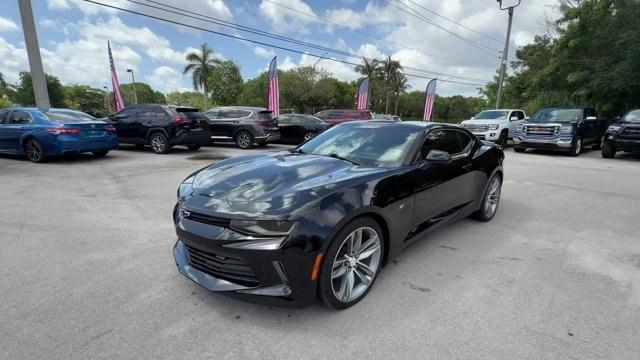 2016 Mosaic Black Metallic /Jet Black Chevrolet Camaro (1G1FD1RSXG0) with an 6 3.6L engine, Automatic transmission, located at 27610 S Dixie Hwy, Homestead, FL, 33032, (305) 749-2348, 25.510241, -80.438301 - Ward's 10 Best Engines. Only 103,457 Miles! Boasts 27 Highway MPG and 18 City MPG! This Chevrolet Camaro boasts a Gas V6 3.6L/222 engine powering this Automatic transmission. WHEELS, 20 (50.8 CM) 5-SPLIT SPOKE PREMIUM GRAY-PAINTED, MACHINED-FACE ALUMINUM, TRANSMISSION, 8-SPEED AUTOMATIC includes tra- Photo#0