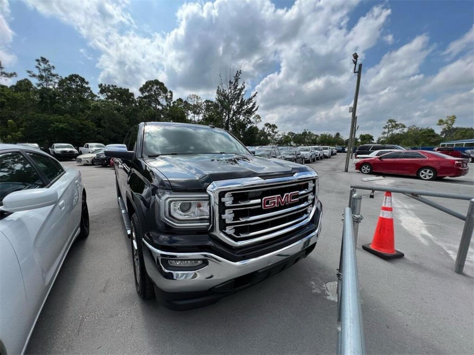 2017 Onyx Black /Black GMC Sierra 1500 SLT (3GTP1NEC9HG) with an EcoTec3 5.3L V8 engine, Automatic transmission, located at 27610 S Dixie Hwy, Homestead, FL, 33032, (305) 749-2348, 25.510241, -80.438301 - Photo #0