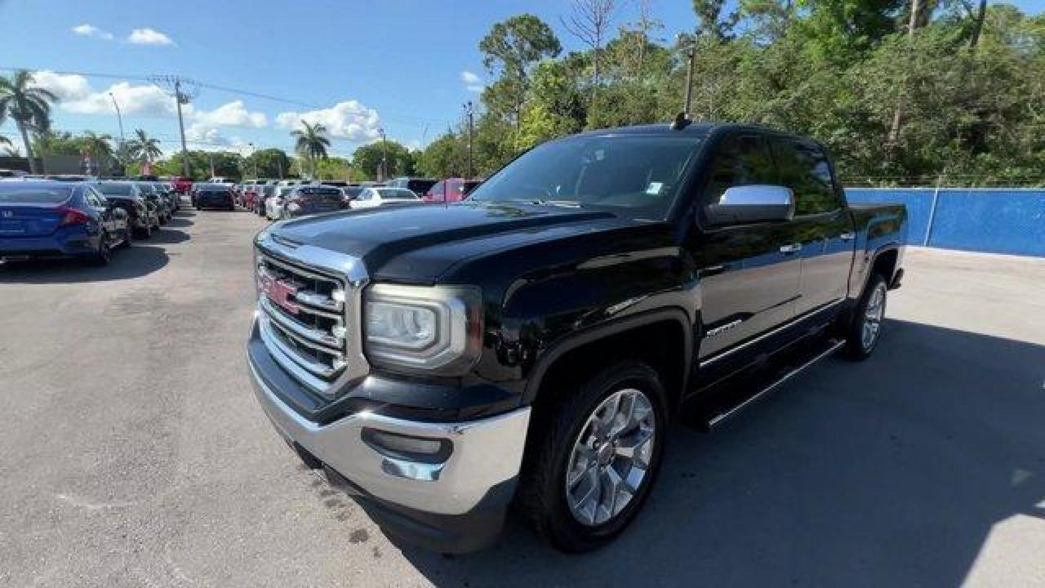 2017 Onyx Black /Black GMC Sierra 1500 SLT (3GTP1NEC9HG) with an EcoTec3 5.3L V8 engine, Automatic transmission, located at 27610 S Dixie Hwy, Homestead, FL, 33032, (305) 749-2348, 25.510241, -80.438301 - Photo #1