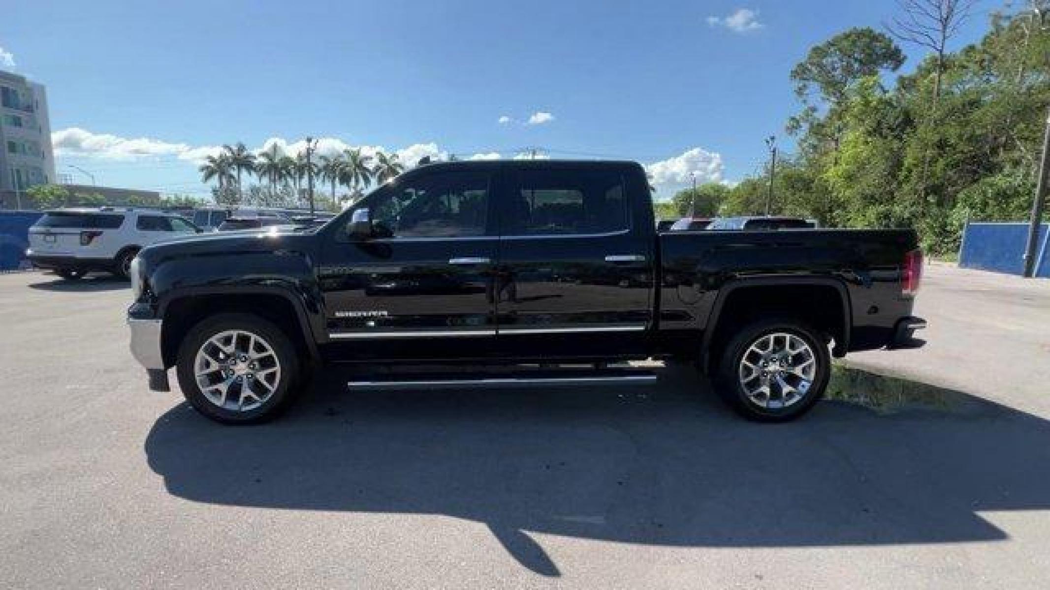 2017 Onyx Black /Black GMC Sierra 1500 SLT (3GTP1NEC9HG) with an EcoTec3 5.3L V8 engine, Automatic transmission, located at 27610 S Dixie Hwy, Homestead, FL, 33032, (305) 749-2348, 25.510241, -80.438301 - Photo #2