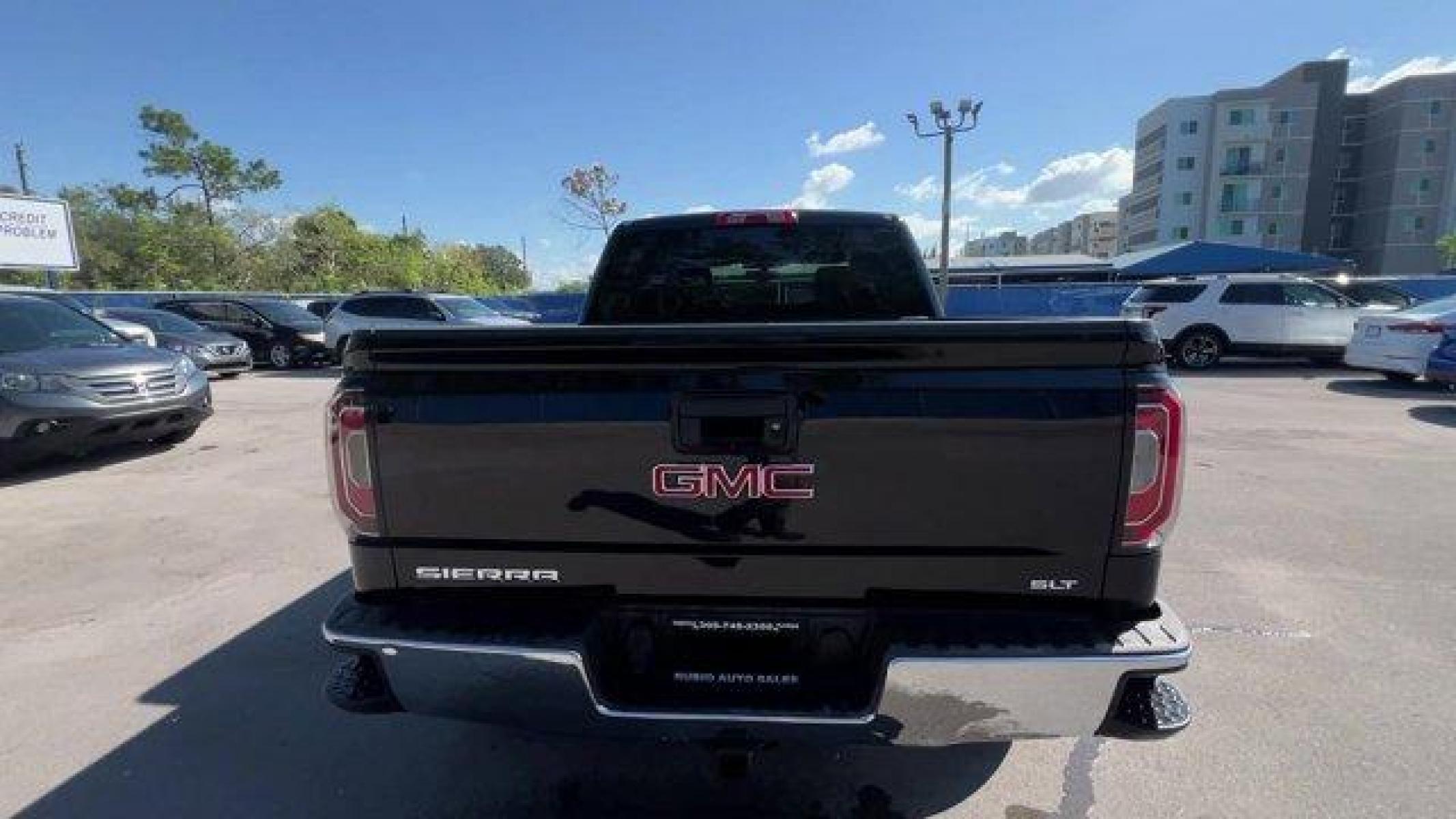 2017 Onyx Black /Black GMC Sierra 1500 SLT (3GTP1NEC9HG) with an EcoTec3 5.3L V8 engine, Automatic transmission, located at 27610 S Dixie Hwy, Homestead, FL, 33032, (305) 749-2348, 25.510241, -80.438301 - Photo #4