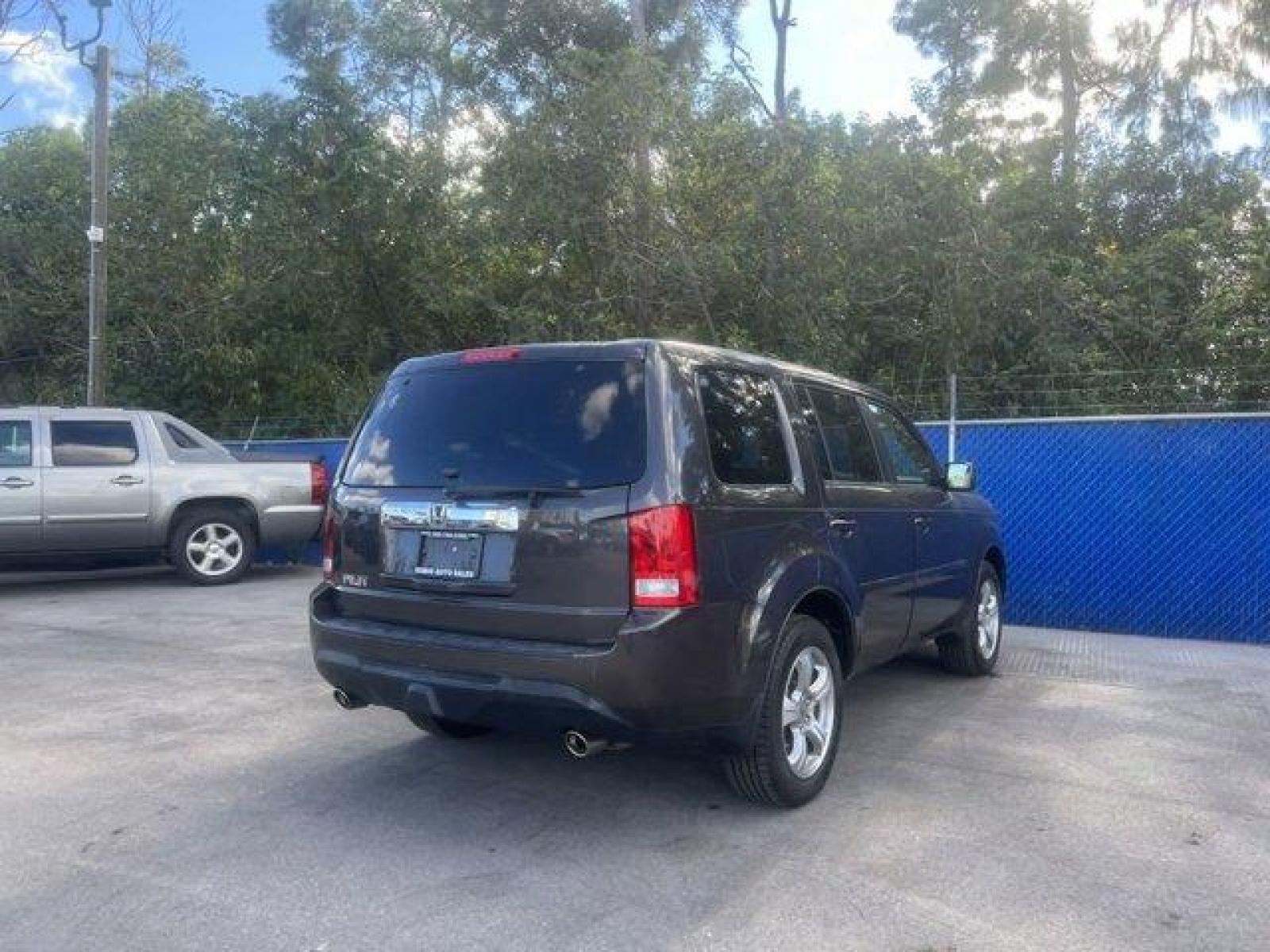 2014 Gray Honda Pilot EX-L (5FNYF3H55EB) with an 6 3.5 L engine, Automatic transmission, located at 27610 S Dixie Hwy, Homestead, FL, 33032, (305) 749-2348, 25.510241, -80.438301 - KBB.com 12 Best Family Cars. Boasts 25 Highway MPG and 18 City MPG! This Honda Pilot boasts a Regular Unleaded V-6 3.5 L/212 engine powering this Automatic transmission. XM Radio -inc: SiriusXM services require a subscription after any trial period, If you decide to continue your SiriusXM service at - Photo #4
