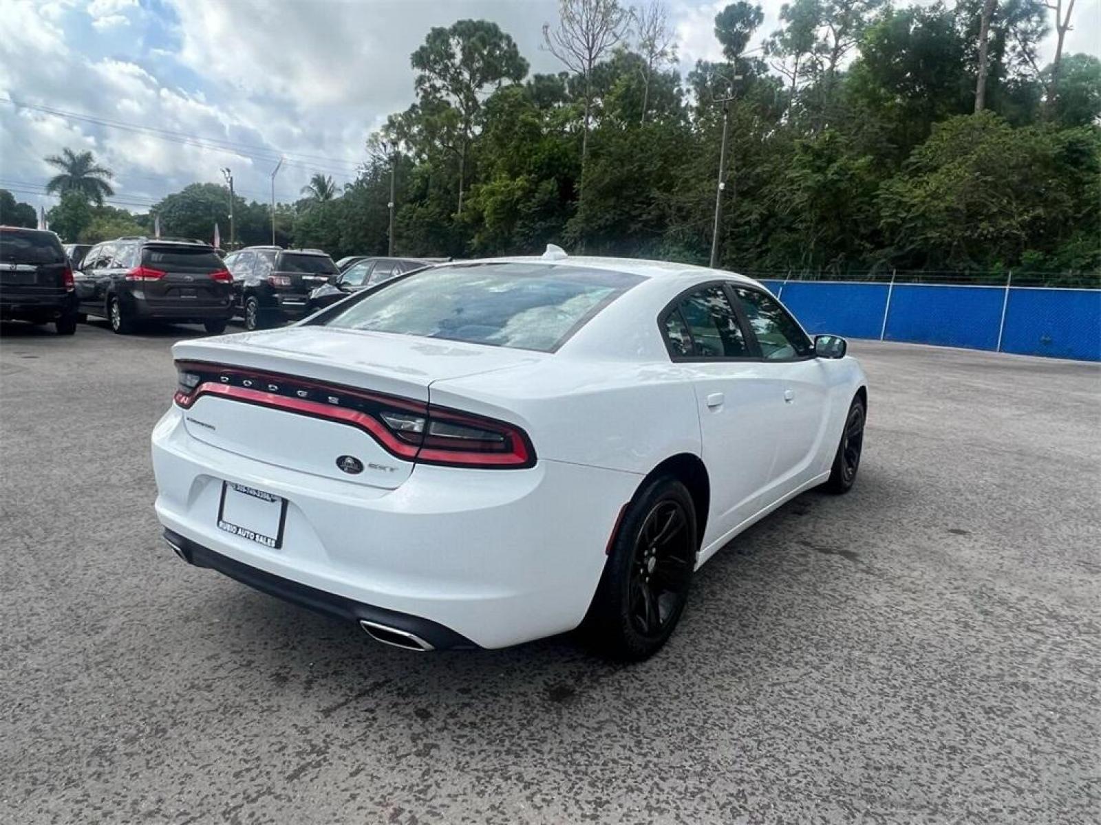 2016 Bright White Clearcoat /Black Dodge Charger SXT (2C3CDXHG8GH) with an 3.6L 6-Cylinder SMPI DOHC engine, Automatic transmission, located at 27610 S Dixie Hwy, Homestead, FL, 33032, (305) 749-2348, 25.510241, -80.438301 - Photo #2