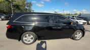 2013 Black Honda Odyssey (5FNRL5H97DB) with an 6 3.5L engine, Automatic transmission, located at 27610 S Dixie Hwy, Homestead, FL, 33032, (305) 749-2348, 25.510241, -80.438301 - KBB.com 10 Best Family Cars. Only 119,824 Miles! Boasts 28 Highway MPG and 19 City MPG! This Honda Odyssey boasts a Gas V6 3.5L/212 engine powering this Automatic transmission. XM Radio (subscription required), Wide-mode adjustable 2nd-row seats -inc: leather trimmed outboard seats, multi-function c - Photo#5