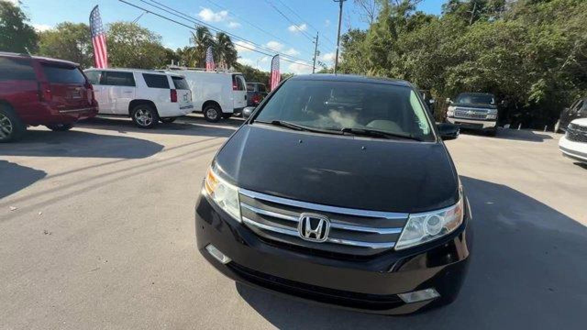2013 Black Honda Odyssey (5FNRL5H97DB) with an 6 3.5L engine, Automatic transmission, located at 27610 S Dixie Hwy, Homestead, FL, 33032, (305) 749-2348, 25.510241, -80.438301 - KBB.com 10 Best Family Cars. Only 119,824 Miles! Boasts 28 Highway MPG and 19 City MPG! This Honda Odyssey boasts a Gas V6 3.5L/212 engine powering this Automatic transmission. XM Radio (subscription required), Wide-mode adjustable 2nd-row seats -inc: leather trimmed outboard seats, multi-function c - Photo#7