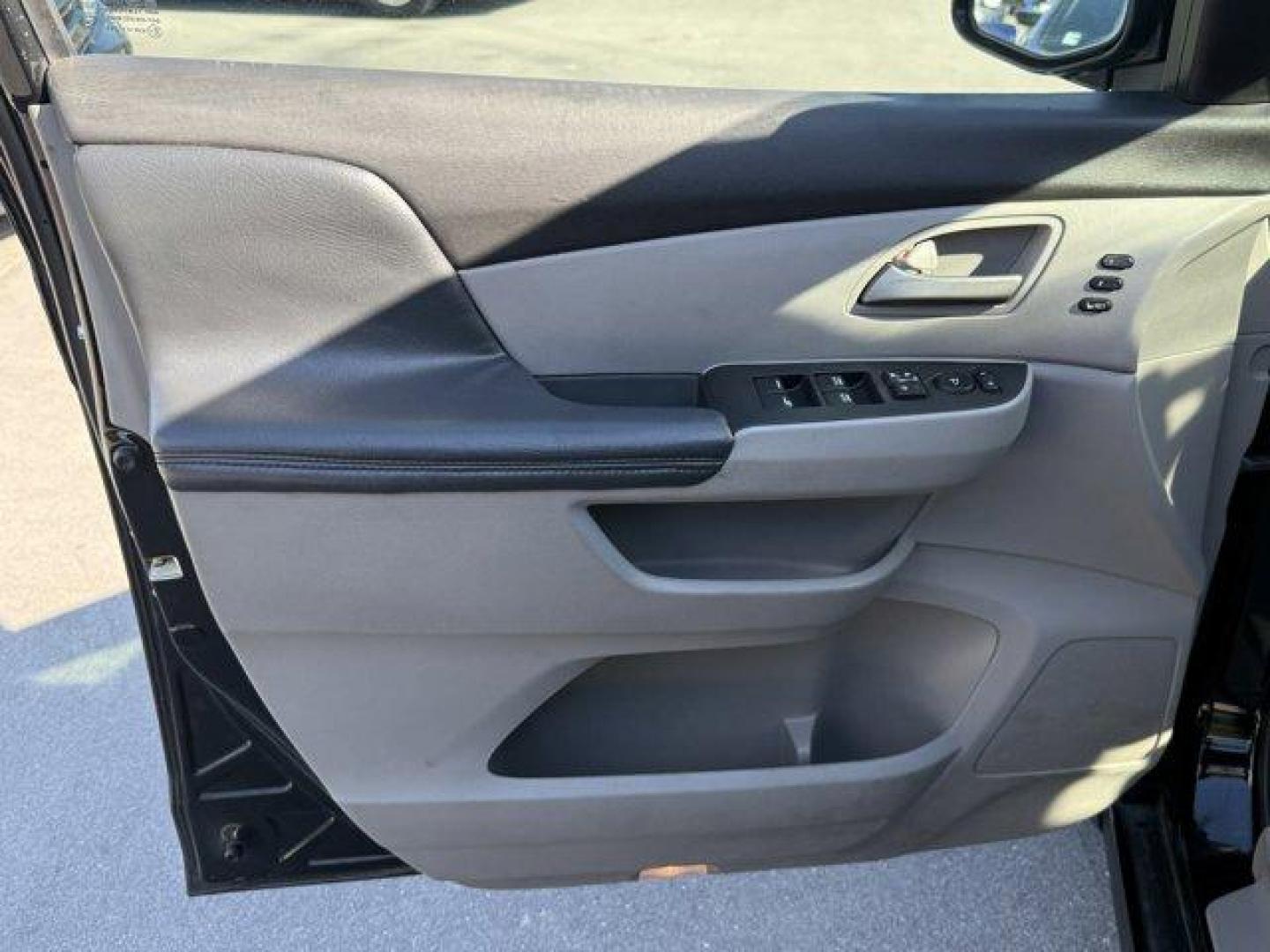 2013 Black Honda Odyssey (5FNRL5H97DB) with an 6 3.5L engine, Automatic transmission, located at 27610 S Dixie Hwy, Homestead, FL, 33032, (305) 749-2348, 25.510241, -80.438301 - KBB.com 10 Best Family Cars. Only 119,824 Miles! Boasts 28 Highway MPG and 19 City MPG! This Honda Odyssey boasts a Gas V6 3.5L/212 engine powering this Automatic transmission. XM Radio (subscription required), Wide-mode adjustable 2nd-row seats -inc: leather trimmed outboard seats, multi-function c - Photo#10