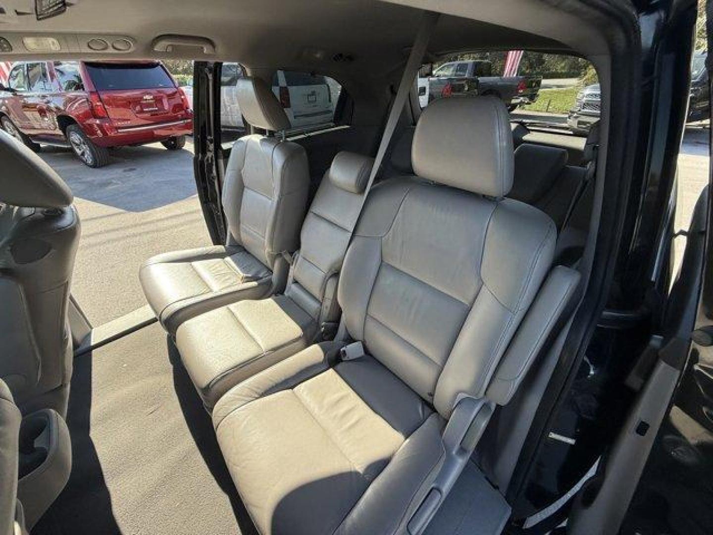 2013 Black Honda Odyssey (5FNRL5H97DB) with an 6 3.5L engine, Automatic transmission, located at 27610 S Dixie Hwy, Homestead, FL, 33032, (305) 749-2348, 25.510241, -80.438301 - KBB.com 10 Best Family Cars. Only 119,824 Miles! Boasts 28 Highway MPG and 19 City MPG! This Honda Odyssey boasts a Gas V6 3.5L/212 engine powering this Automatic transmission. XM Radio (subscription required), Wide-mode adjustable 2nd-row seats -inc: leather trimmed outboard seats, multi-function c - Photo#13