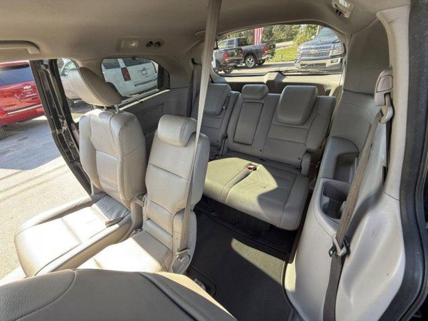 2013 Black Honda Odyssey (5FNRL5H97DB) with an 6 3.5L engine, Automatic transmission, located at 27610 S Dixie Hwy, Homestead, FL, 33032, (305) 749-2348, 25.510241, -80.438301 - KBB.com 10 Best Family Cars. Only 119,824 Miles! Boasts 28 Highway MPG and 19 City MPG! This Honda Odyssey boasts a Gas V6 3.5L/212 engine powering this Automatic transmission. XM Radio (subscription required), Wide-mode adjustable 2nd-row seats -inc: leather trimmed outboard seats, multi-function c - Photo#14