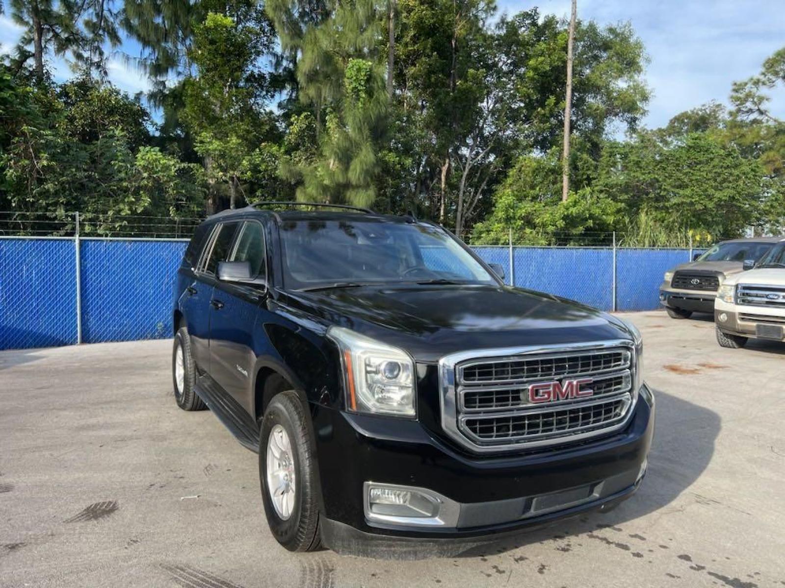 2016 Onyx Black /Jet Black GMC Yukon SLT (1GKS1BKC1GR) with an EcoTec3 5.3L V8 engine, Automatic transmission, located at 27610 S Dixie Hwy, Homestead, FL, 33032, (305) 749-2348, 25.510241, -80.438301 - Photo #1