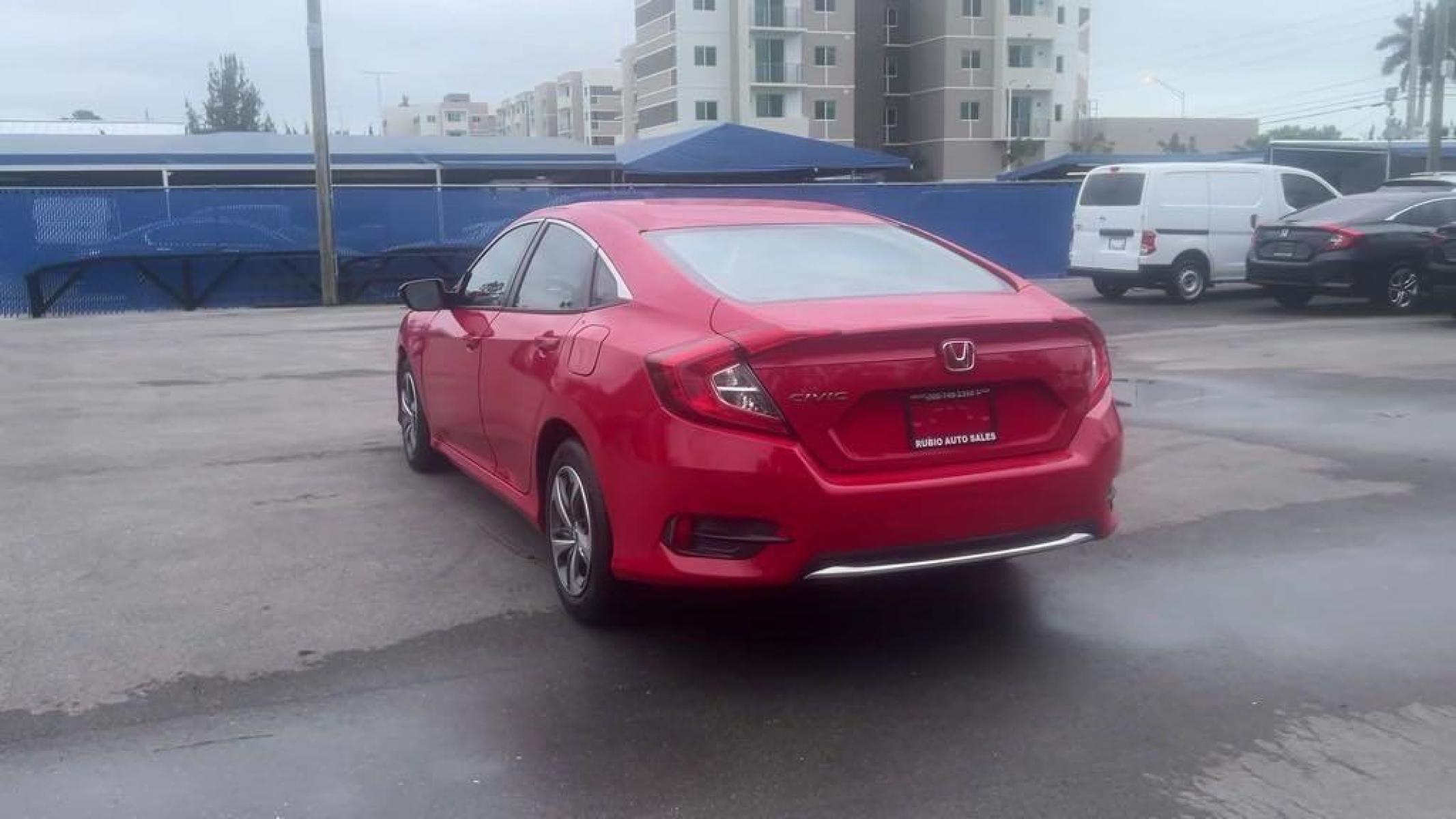 2019 Red /Black Honda Civic LX (2HGFC2F66KH) with an 2.0L I4 DOHC 16V i-VTEC engine, CVT transmission, located at 27610 S Dixie Hwy, Homestead, FL, 33032, (305) 749-2348, 25.510241, -80.438301 - Photo #3