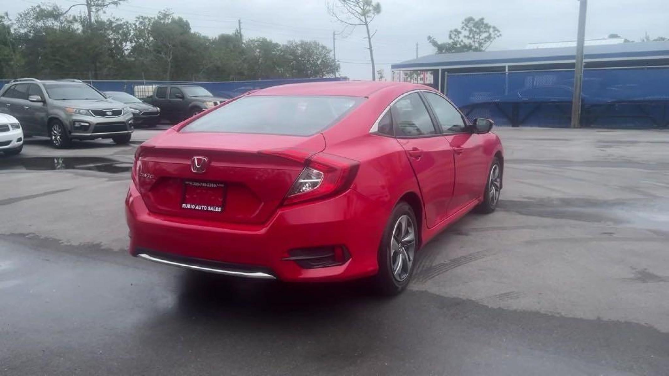 2019 Red /Black Honda Civic LX (2HGFC2F66KH) with an 2.0L I4 DOHC 16V i-VTEC engine, CVT transmission, located at 27610 S Dixie Hwy, Homestead, FL, 33032, (305) 749-2348, 25.510241, -80.438301 - Photo #5